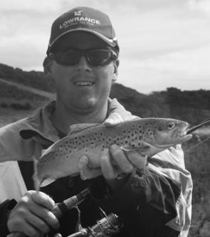 This trout took a Rapala lure fished in front of a small drain that was flowing dirty water into the main river.